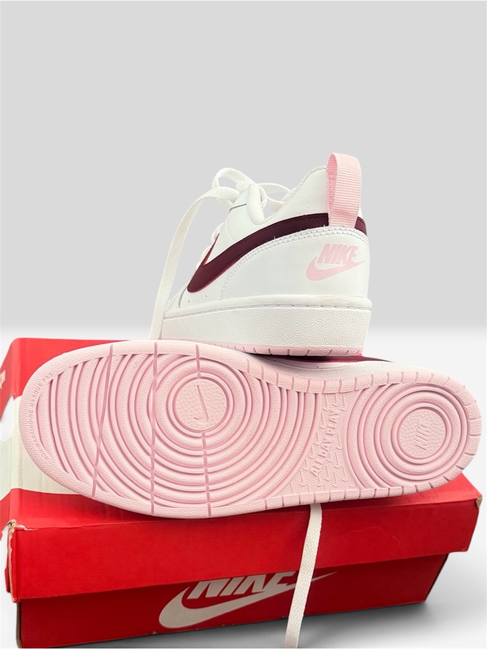Nike Kids Low-Top Sneakers in White, Pink and Maroon